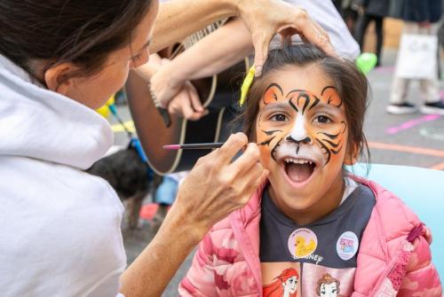 Child with tiger face painting